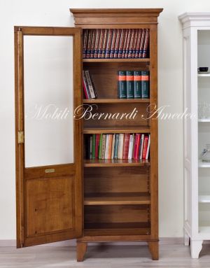 Vetrina libreria realizzata in legno massello di noce ad 1 anta